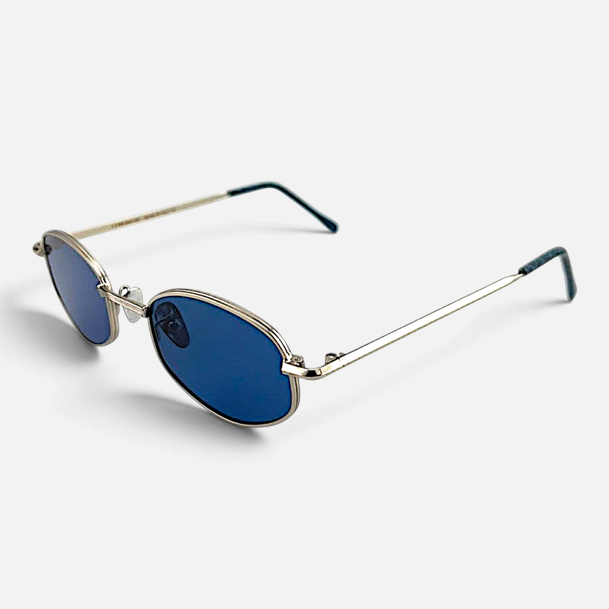 Occhiali da sole Bottega di Sguardi Deauville con montatura ovale in metallo dorato e lenti blu