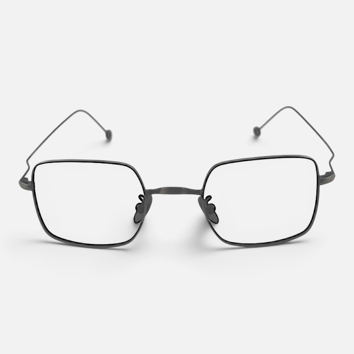 Occhiali da vista Bottega di Sguardi Myho con montatura sottile in metallo scuro e design geometrico essenziale