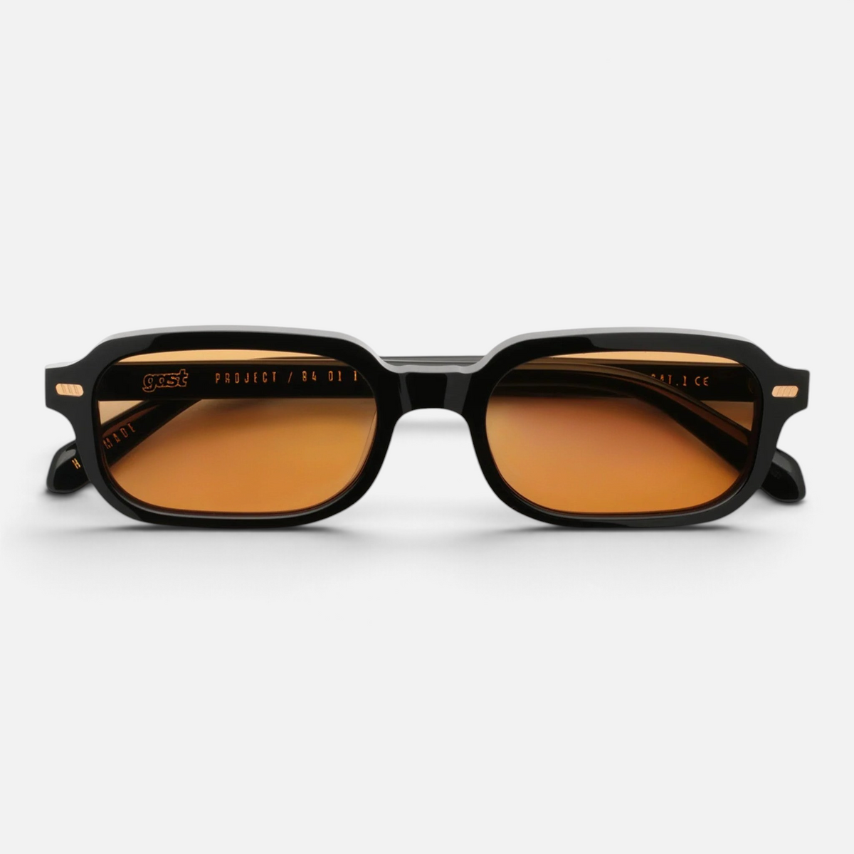 Occhiali da sole Bottega di Sguardi Gast Voce con montatura in acetato nero e lenti color ambra rettangolari