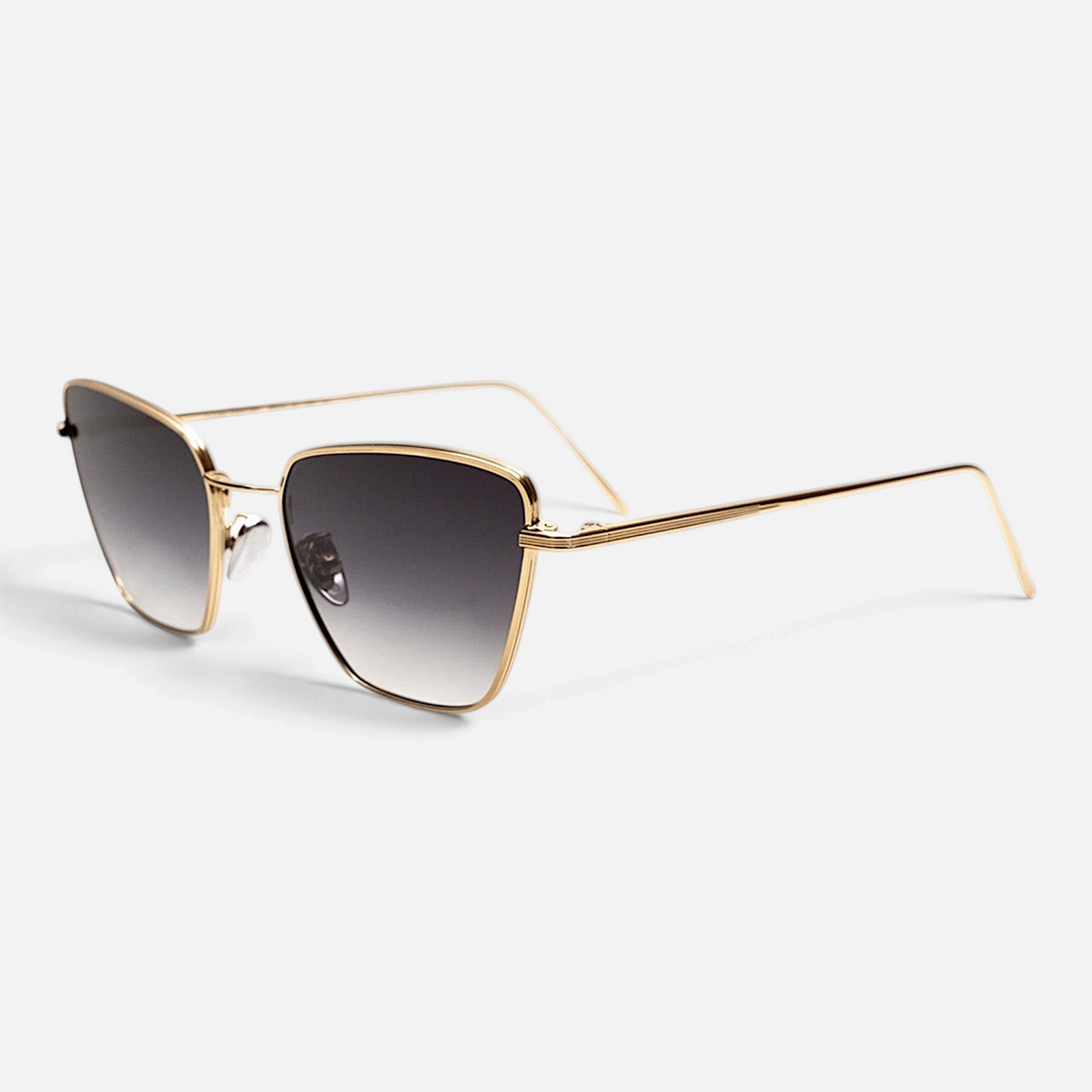 Occhiali da sole Bottega di Sguardi Anakao cat-eye in acciaio dorato con lenti sfumate grigie
